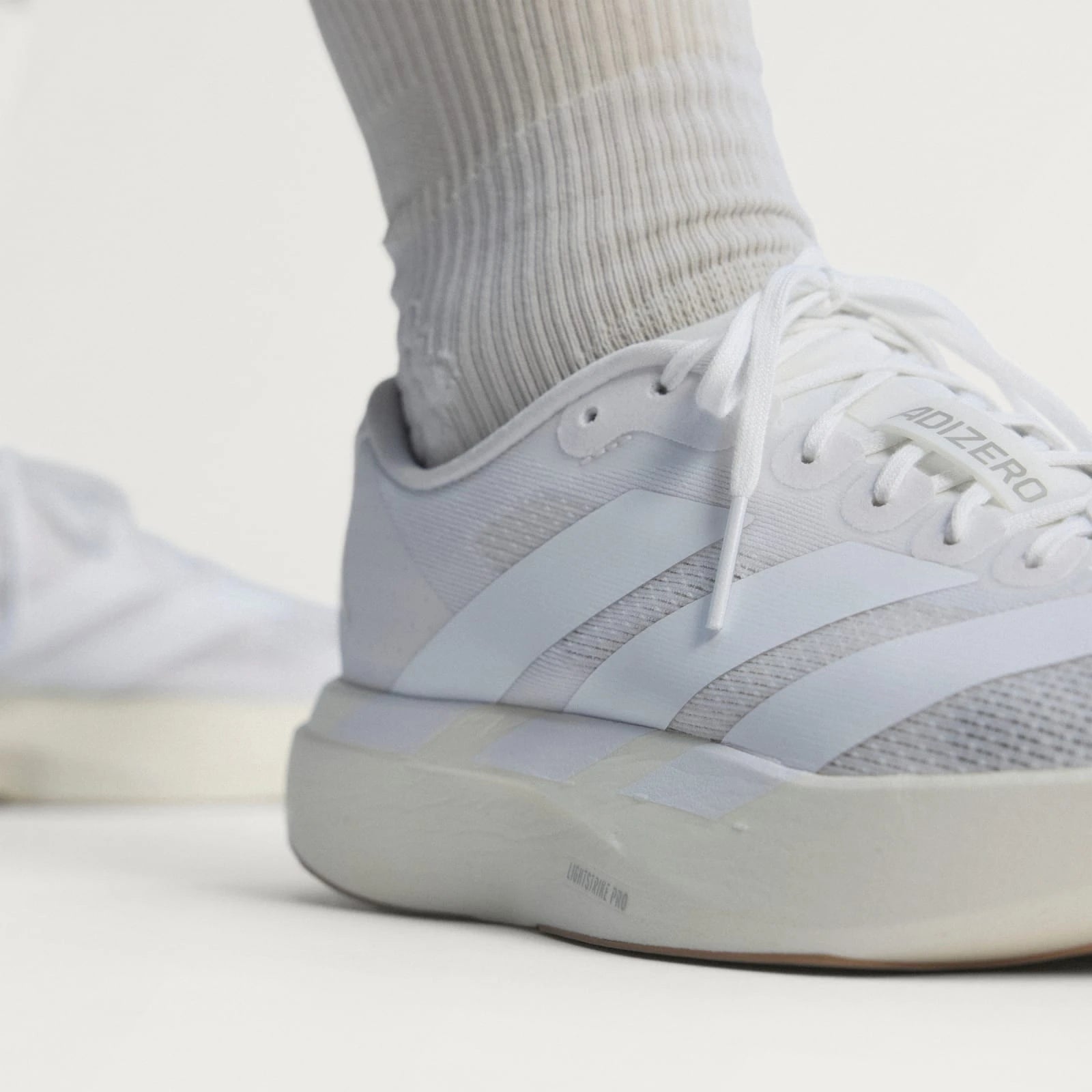Adidas Tênis Adizero EVO SL Cloud White