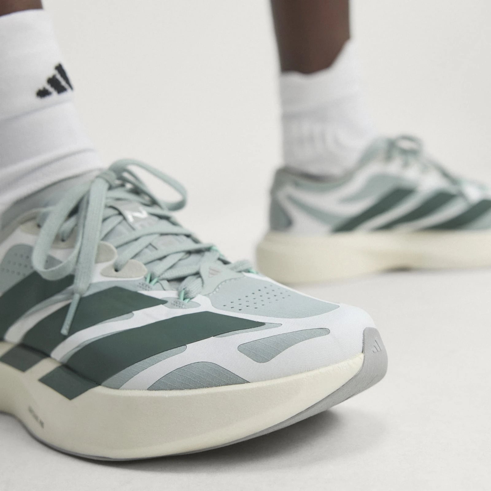 Adidas Tênis ADIZERO EVO SL EXO Wonder Sage