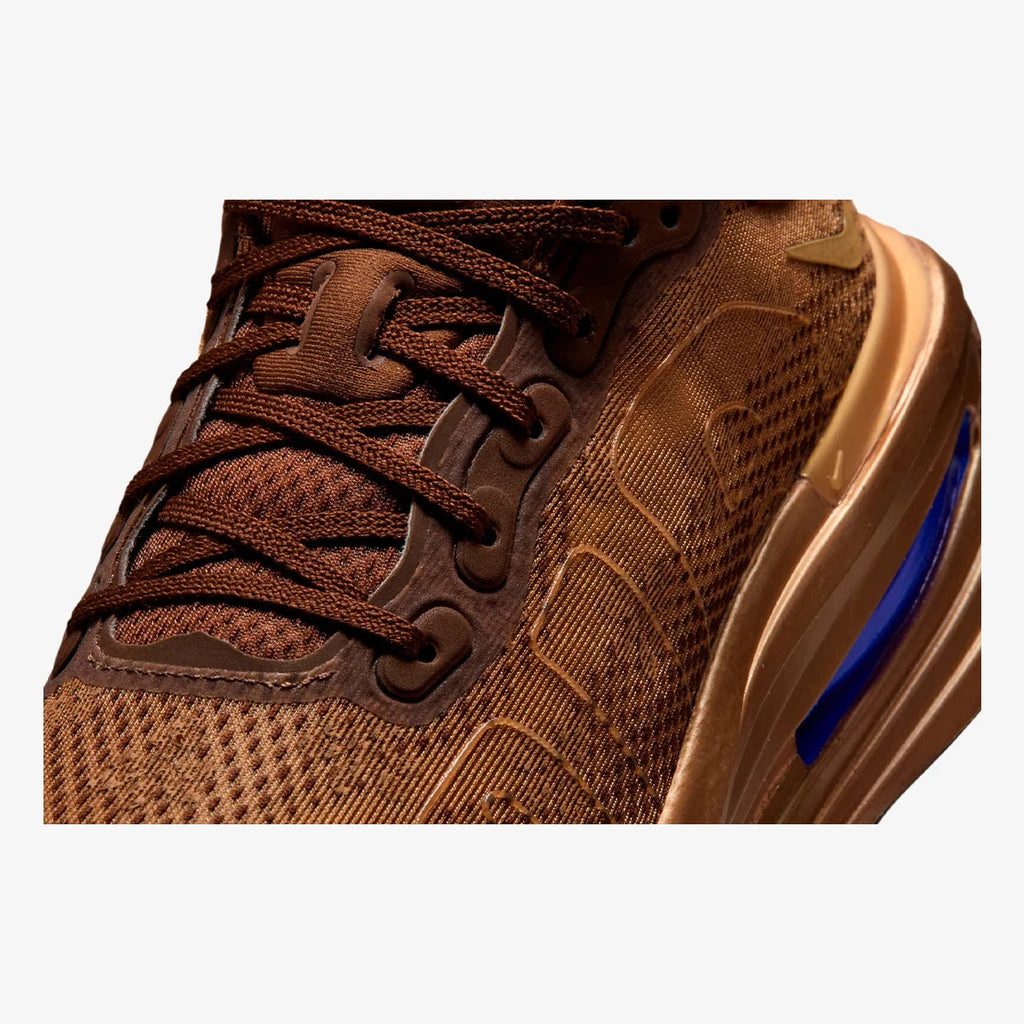 nike vomero premium flat stout marrom