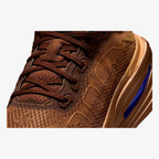 nike vomero premium flat stout marrom