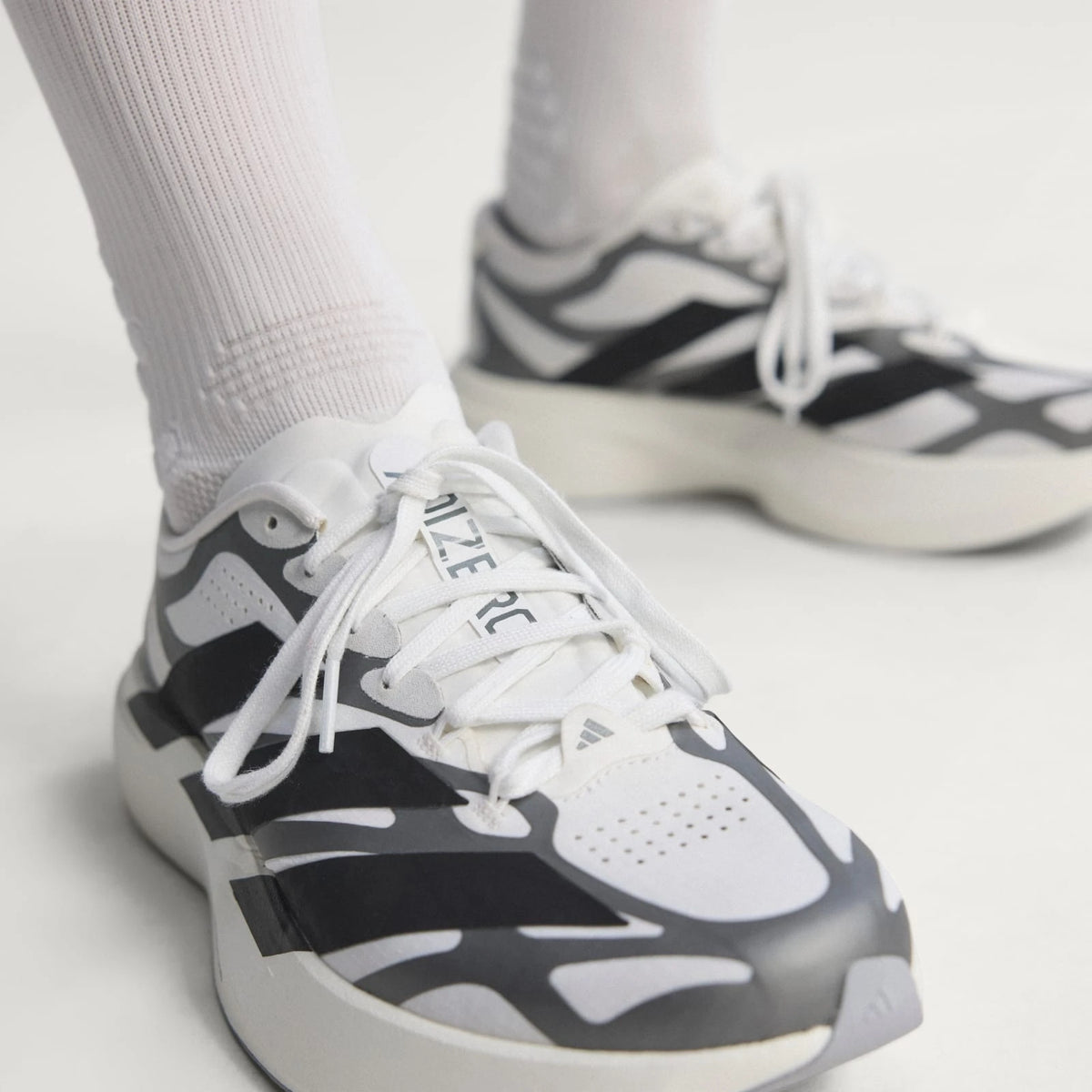 Adidas Tênis ADIZERO EVO SL EXO Cloud White