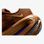 nike vomero premium flat stout marrom