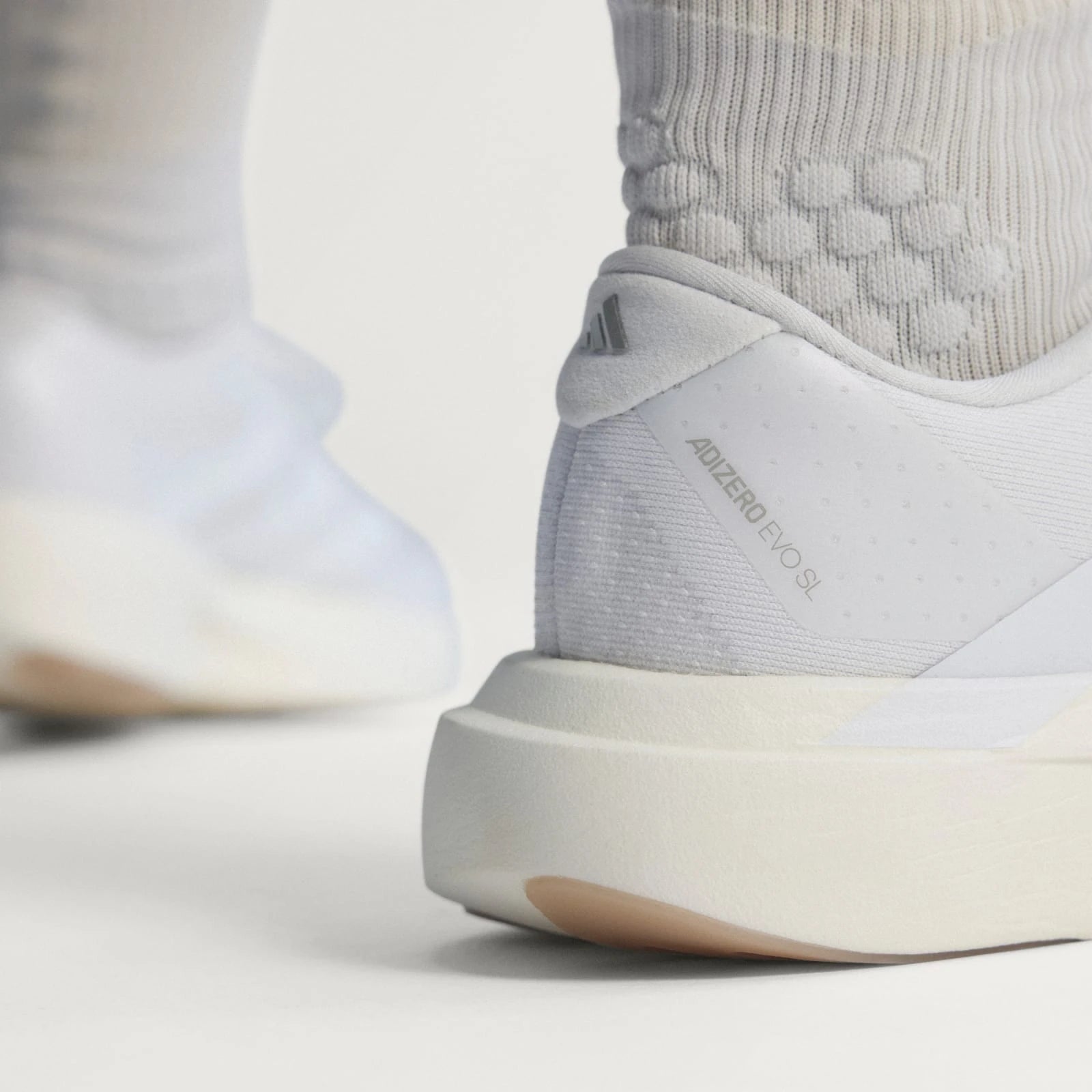 Adidas Tênis Adizero EVO SL Cloud White