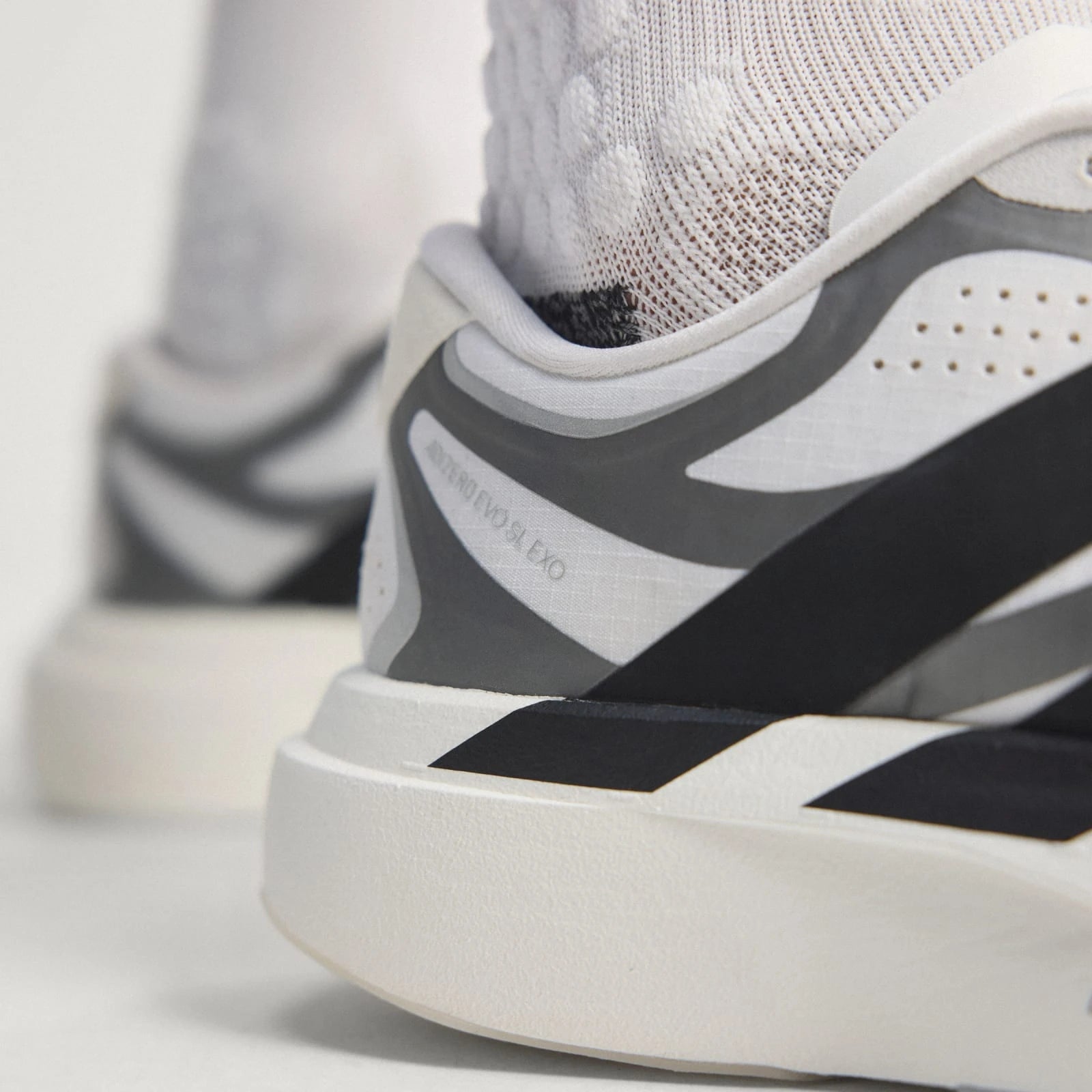 Adidas Tênis ADIZERO EVO SL EXO Cloud White